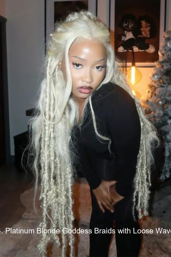 14. Platinum Blonde Goddess Braids with Loose Waves