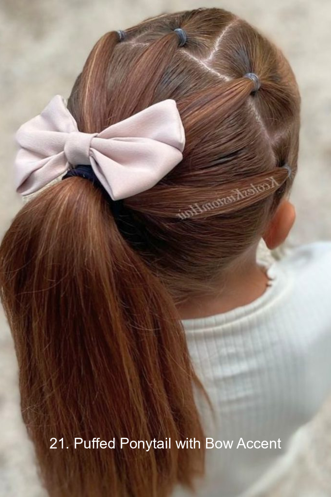 21. Puffed Ponytail with Bow Accent