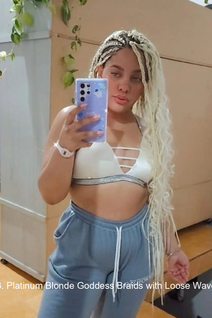 33. Platinum Blonde Goddess Braids with Loose Waves